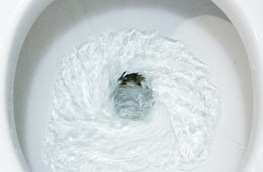 what causes toilet bowl water level to drop
