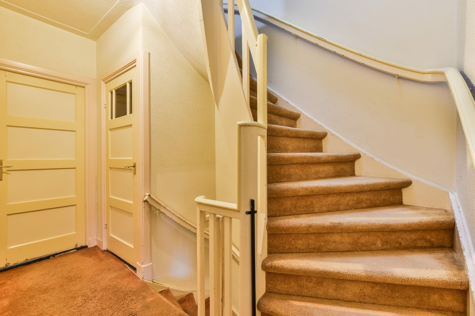 how to protect carpet on stairs